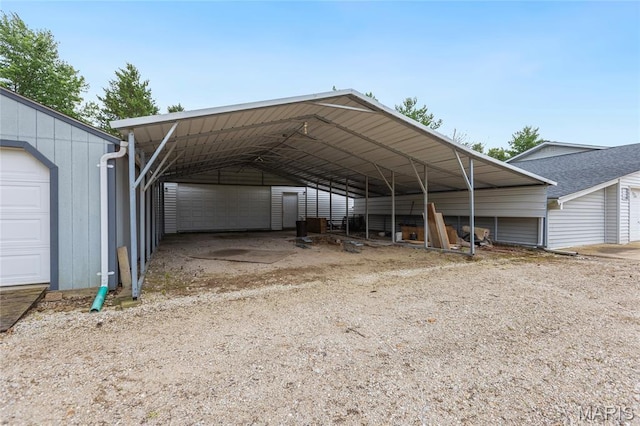 2280 Ebert Ln, Wentzville, MO 63385 - view of parking / parking lot featuring a detached garage