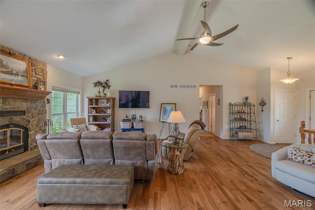 11400 Macs Cove Dr, Wright City, MO 63390 - living room featuring wood finished floors, a ceiling fan, and a fireplace