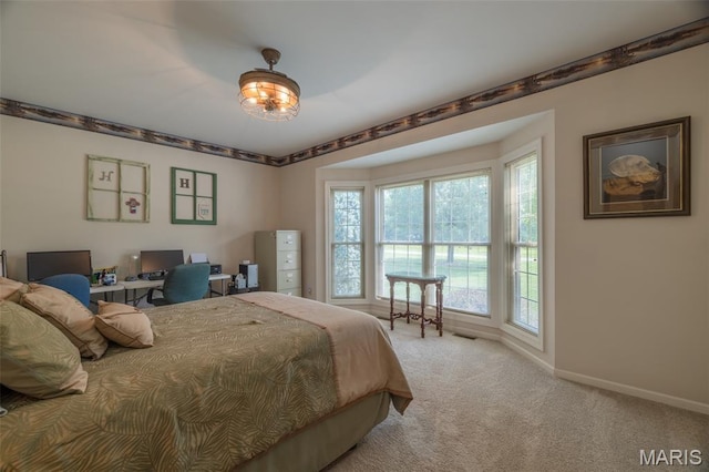 11400 Macs Cove Dr, Wright City, MO 63390 - carpeted bedroom featuring an office area and baseboards