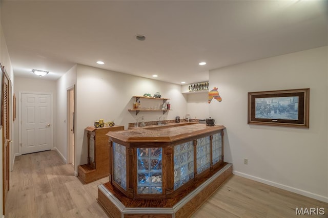 11400 Macs Cove Dr, Wright City, MO 63390 - indoor wet bar featuring light wood-type flooring, baseboards, and recessed lighting