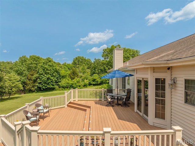 11400 Macs Cove Dr, Wright City, MO 63390 - wooden deck with outdoor dining space and a yard