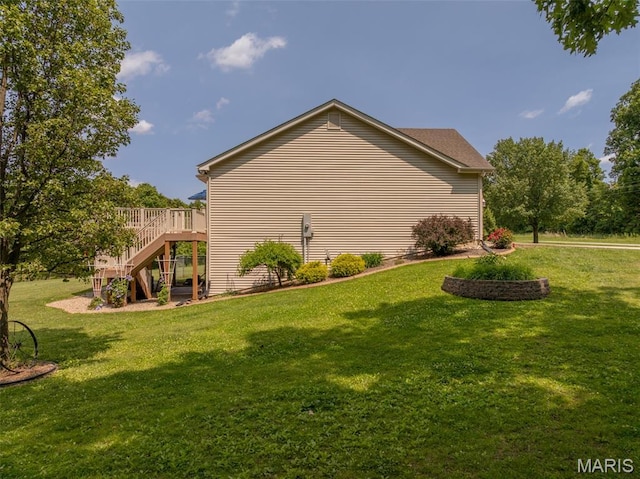 11400 Macs Cove Dr, Wright City, MO 63390 - view of side of home with stairs, a yard, and a wooden deck