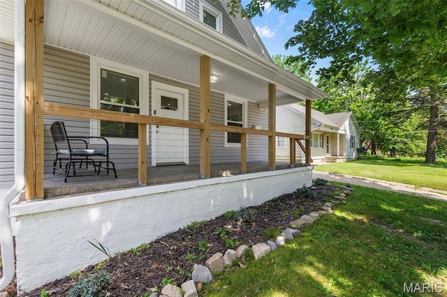 1210 Perryville Rd, Cape Girardeau, MO 63701 - view of side of property with a porch and a yard
