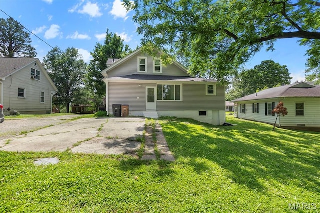 1210 Perryville Rd, Cape Girardeau, MO 63701 - back of house with a lawn