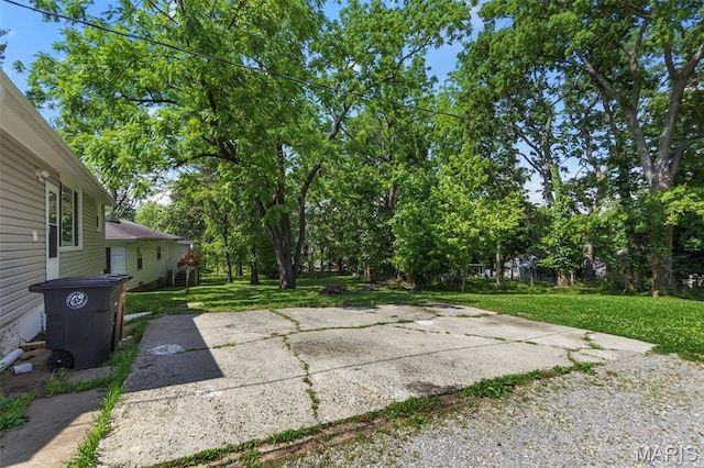 1210 Perryville Rd, Cape Girardeau, MO 63701 - view of patio / terrace with view of wooded area