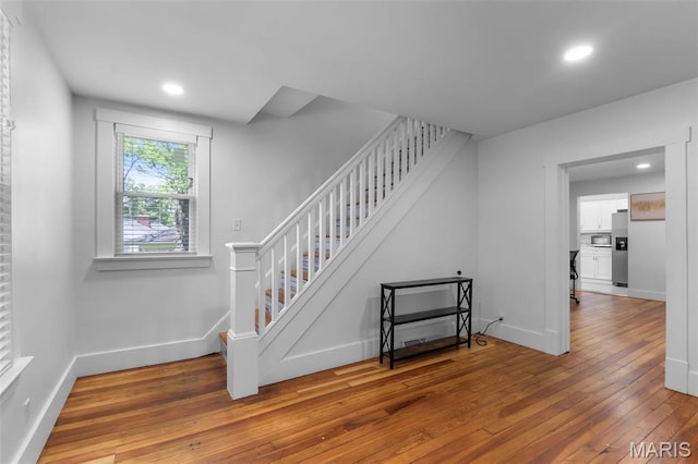 1210 Perryville Rd, Cape Girardeau, MO 63701 - staircase with hardwood / wood-style flooring, recessed lighting, and baseboards