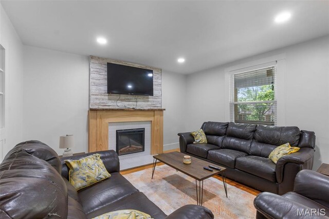 1210 Perryville Rd, Cape Girardeau, MO 63701 - living area with a fireplace, wood finished floors, and recessed lighting