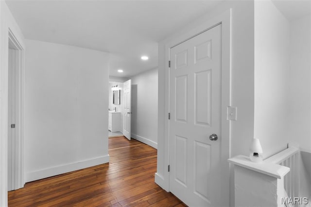 1210 Perryville Rd, Cape Girardeau, MO 63701 - hallway featuring dark wood-style floors, baseboards, and recessed lighting