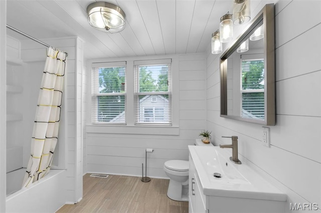 1210 Perryville Rd, Cape Girardeau, MO 63701 - bathroom with healthy amount of natural light, vanity, toilet, and wood finished floors