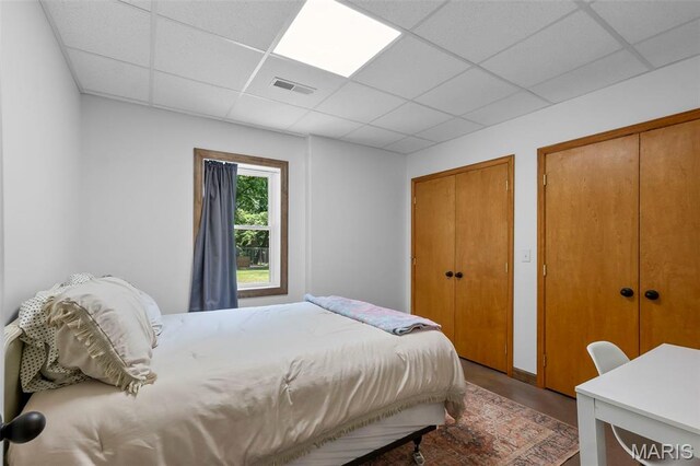 3348 State Hwy E, Scott City, MO 63780 - bedroom with a drop ceiling and two closets