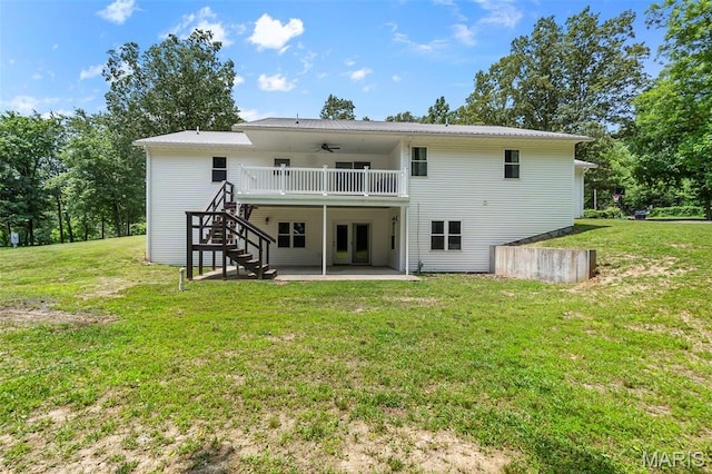 3348 State Hwy E, Scott City, MO 63780 - back of house with a ceiling fan, a patio, a lawn, and stairway