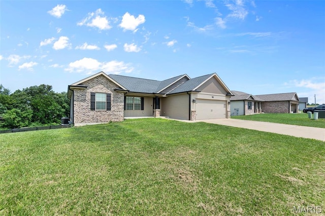 192 Fraser Rdg, Jackson, MO 63755 - single story home featuring brick siding, an attached garage, a front yard, concrete driveway, and central AC unit