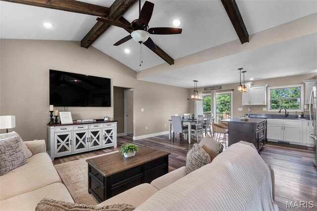 192 Fraser Rdg, Jackson, MO 63755 - living area with dark wood finished floors, ceiling fan, baseboards, and recessed lighting