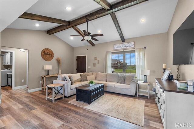 192 Fraser Rdg, Jackson, MO 63755 - living area with ceiling fan, wood finished floors, washing machine and dryer, recessed lighting, and baseboards
