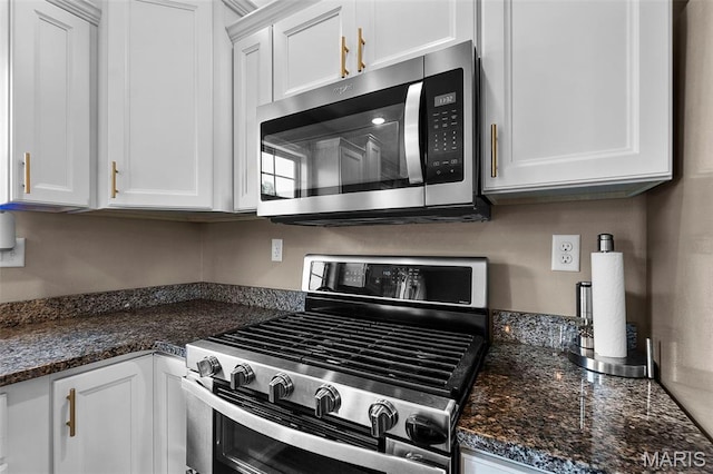 192 Fraser Rdg, Jackson, MO 63755 - kitchen with appliances with stainless steel finishes, white cabinetry, and dark stone countertops