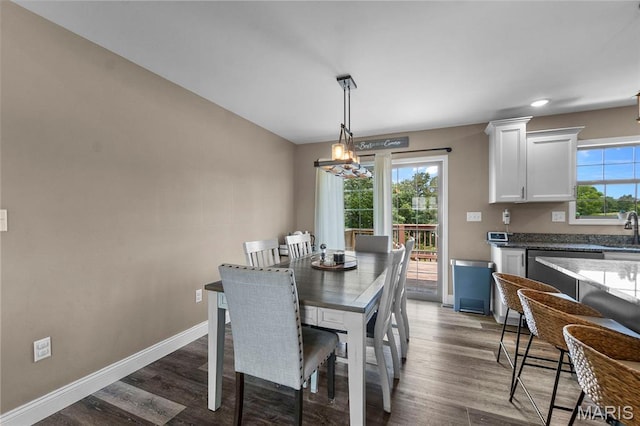 192 Fraser Rdg, Jackson, MO 63755 - dining space with baseboards, a chandelier, and dark wood-style floors