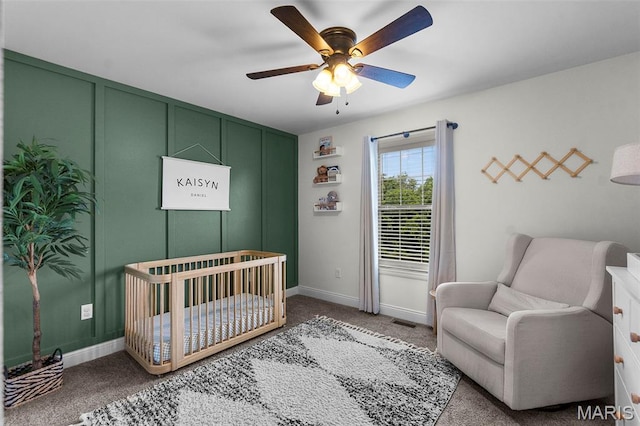 192 Fraser Rdg, Jackson, MO 63755 - carpeted bedroom with baseboards, a crib, and ceiling fan