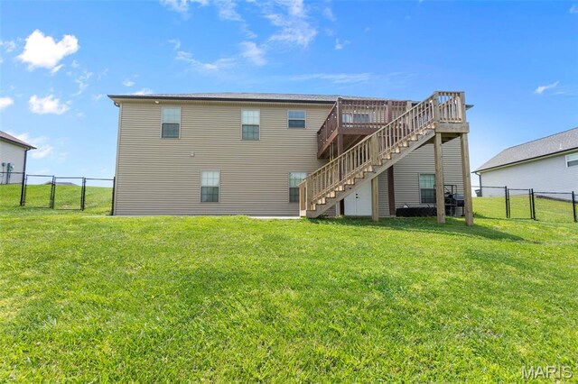192 Fraser Rdg, Jackson, MO 63755 - rear view of house featuring stairway, a gate, and a deck