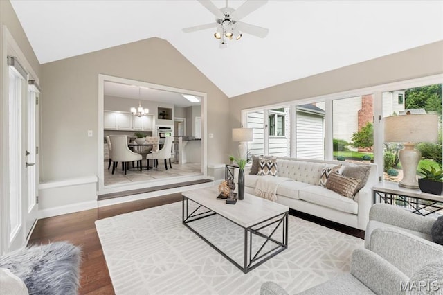 1525 Honey Locust Ct, Wildwood, MO 63005 - living area featuring vaulted ceiling, wood finished floors, a chandelier, and a ceiling fan