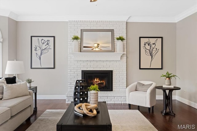 1525 Honey Locust Ct, Wildwood, MO 63005 - living room featuring dark wood finished floors, ornamental molding, a brick fireplace, and ceiling fan