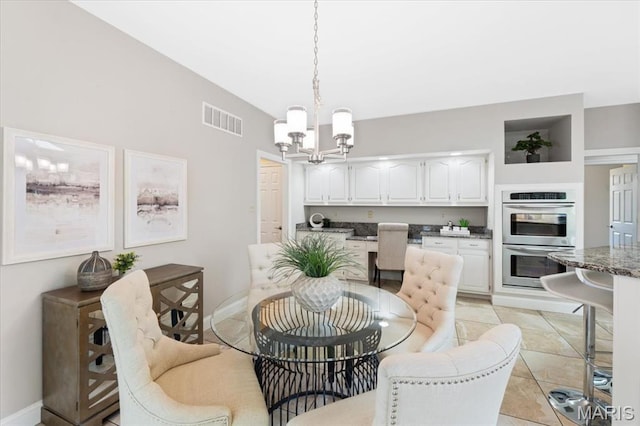 1525 Honey Locust Ct, Wildwood, MO 63005 - dining area featuring a chandelier and light tile patterned flooring