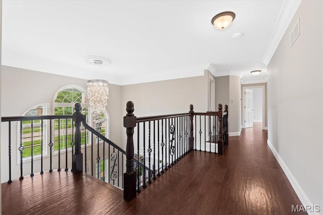 1525 Honey Locust Ct, Wildwood, MO 63005 - hallway with an upstairs landing, wood finished floors, a chandelier, and ornamental molding
