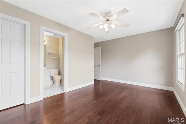 1525 Honey Locust Ct, Wildwood, MO 63005 - unfurnished bedroom with dark wood-style floors and a ceiling fan
