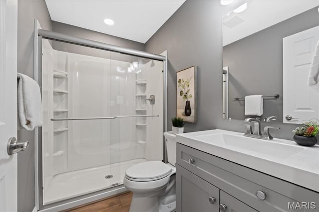 1525 Honey Locust Ct, Wildwood, MO 63005 - full bathroom with a stall shower, vanity, and wood finished floors
