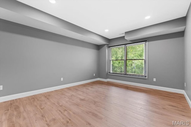 1525 Honey Locust Ct, Wildwood, MO 63005 - empty room with wood finished floors and recessed lighting