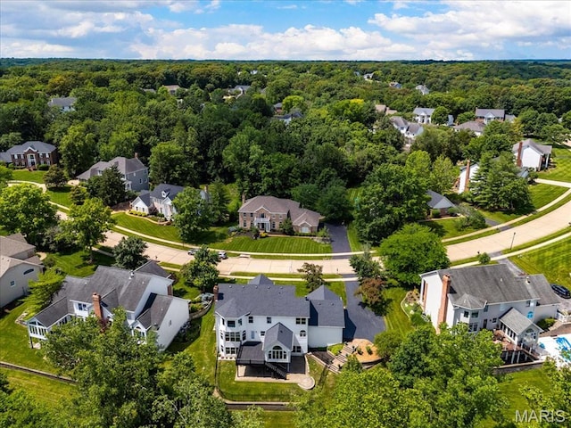 1525 Honey Locust Ct, Wildwood, MO 63005 - aerial view of residential area featuring a heavily wooded area