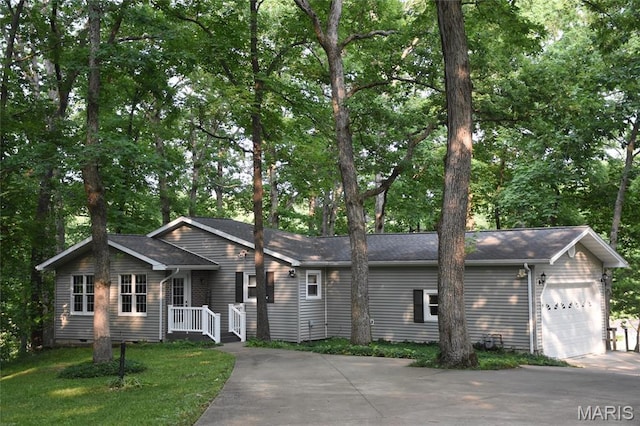 8404 E Twin Oaks Dr, Effingham, IL 62401 - ranch-style home with an attached garage and asphalt driveway