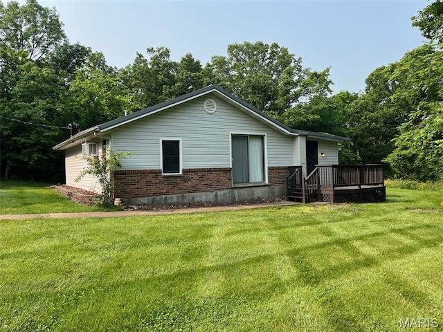 11142 E State Highway 47, Cadet, MO 63630 - view of front of property with brick siding, a wooden deck, and a front yard
