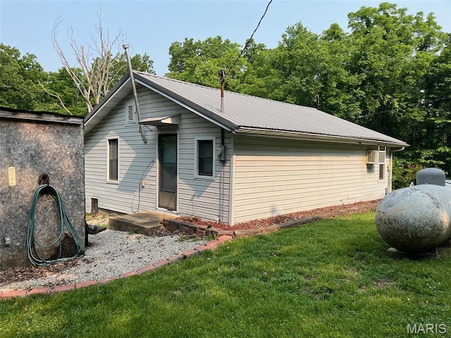 11142 E State Highway 47, Cadet, MO 63630 - view of front of home with a front yard and metal roof