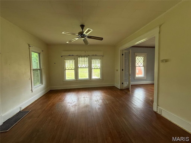 417 N Section St, Hannibal, MO 63401 - empty room featuring baseboards, a ceiling fan, and dark wood-style floors