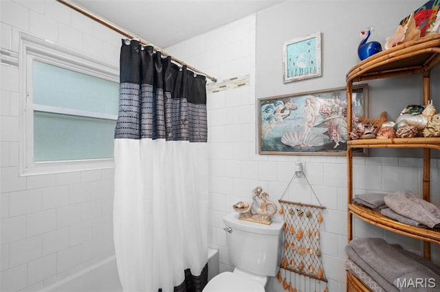 2604 Jonathan Dr, Mehlville, MO 63125 - bathroom featuring shower / tub combo and tile walls