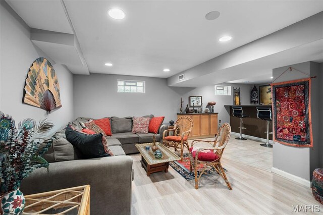 2604 Jonathan Dr, Mehlville, MO 63125 - living area featuring a dry bar, recessed lighting, and light wood finished floors