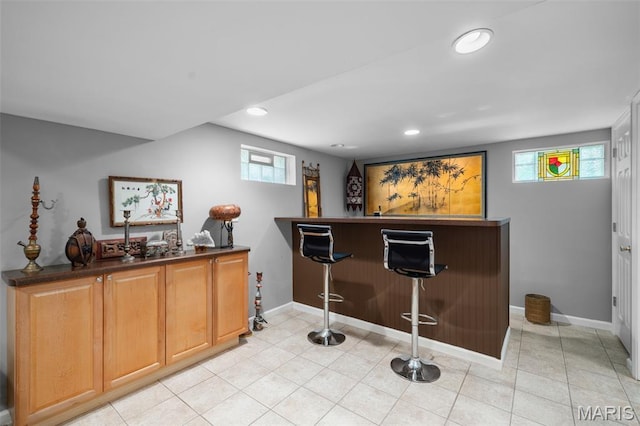 2604 Jonathan Dr, Mehlville, MO 63125 - indoor bar featuring recessed lighting and light tile patterned flooring
