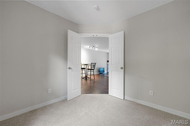 12958 Bryce Canyon Dr Unit C, Maryland Heights, MO 63043 - carpeted spare room featuring baseboards