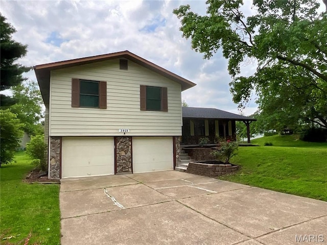 3919 Bellvue Dr, Saint Peters, MO 63376 - view of front of house featuring stone siding, a front lawn, a garage, and driveway