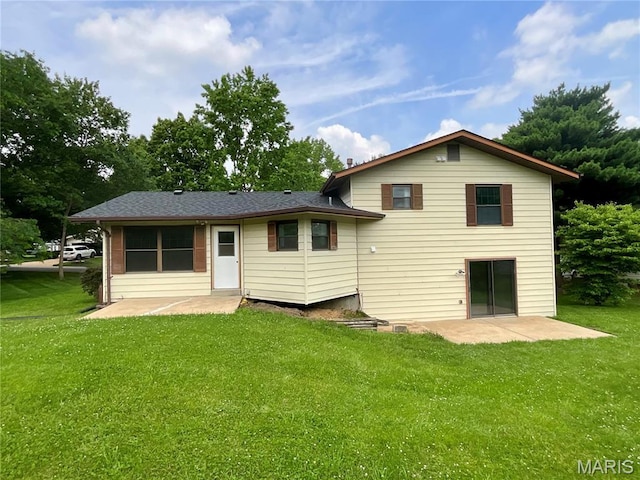 3919 Bellvue Dr, Saint Peters, MO 63376 - back of house featuring a patio area and a lawn