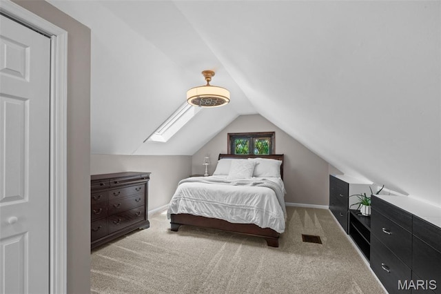 6314 Chippewa St, Saint Louis, MO 63109 - carpeted bedroom with lofted ceiling, a skylight, and baseboards