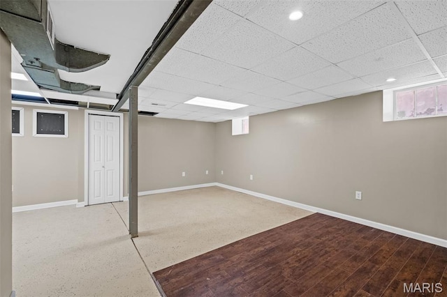 6314 Chippewa St, Saint Louis, MO 63109 - below grade area with baseboards, recessed lighting, and a drop ceiling