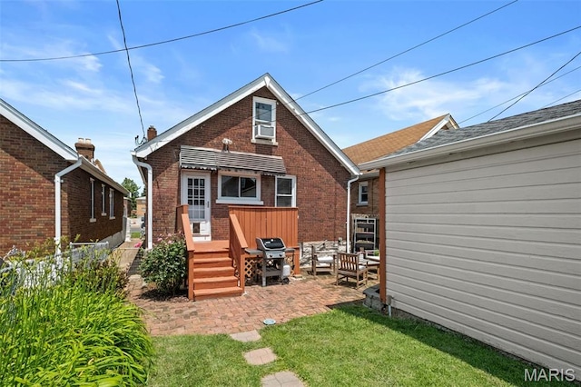 6314 Chippewa St, Saint Louis, MO 63109 - back of property featuring brick siding, a wooden deck, and cooling unit