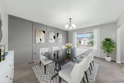 3169 Willow Point Dr, Imperial, MO 63052 - carpeted dining space featuring a chandelier