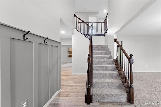 3169 Willow Point Dr, Imperial, MO 63052 - stairway with a high ceiling and wood finished floors