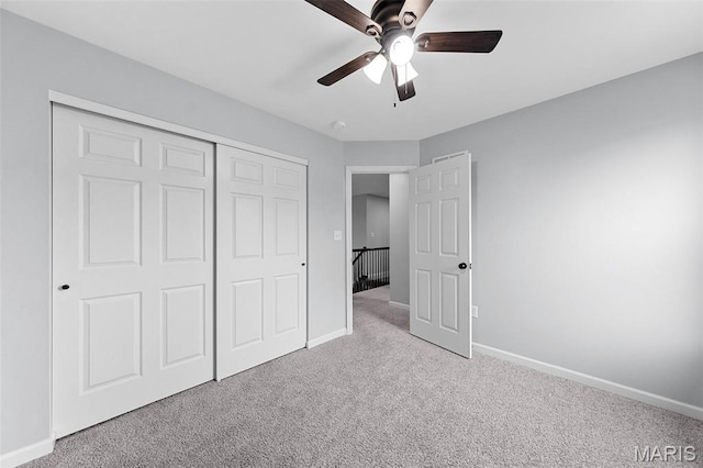 3169 Willow Point Dr, Imperial, MO 63052 - unfurnished bedroom with carpet, a closet, and ceiling fan