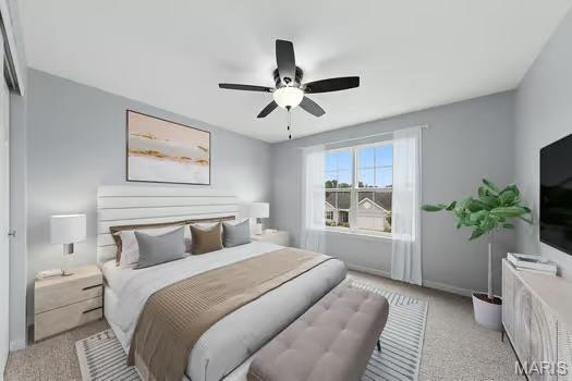 3169 Willow Point Dr, Imperial, MO 63052 - bedroom with a ceiling fan and light colored carpet