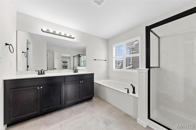 3169 Willow Point Dr, Imperial, MO 63052 - bathroom with a bath, double vanity, a shower with shower door, and tile patterned flooring