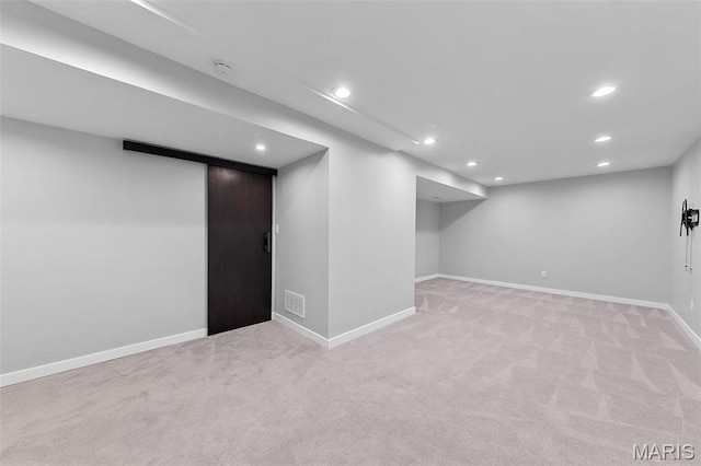 3169 Willow Point Dr, Imperial, MO 63052 - finished basement featuring light carpet and recessed lighting