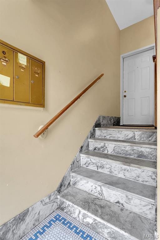 6026 Waterman Ave Unit 3E, Saint Louis, MO 63112 - staircase featuring tile patterned flooring